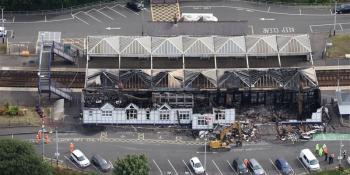 An aerial view showing the extent of fire damage at Troon station