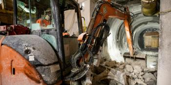 An excavator digs a cross-passage on High Speed 2's Chiltern Tunnels. HS2 Ltd