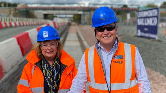 Transport Minister Fiona Hyslop and Scotland's Railway Managing Director Alex Hynes mark completion of track laying on the Levenmouth Rail Link.